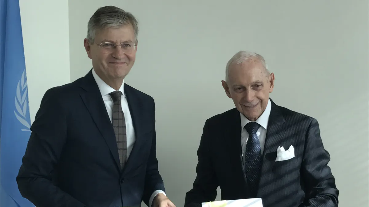 The UN Migration Agency Director General William Lacy Swing and the Under-Secretary-General for Peacekeeping Operations Jean-Pierre Lacroix