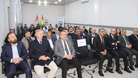 people sitting down looking at one direction