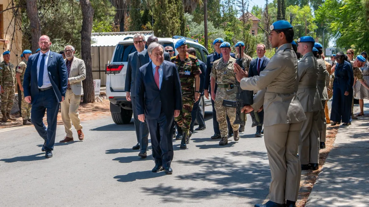 UN Secretary-General walking ahead of UN officials in Cyprus.