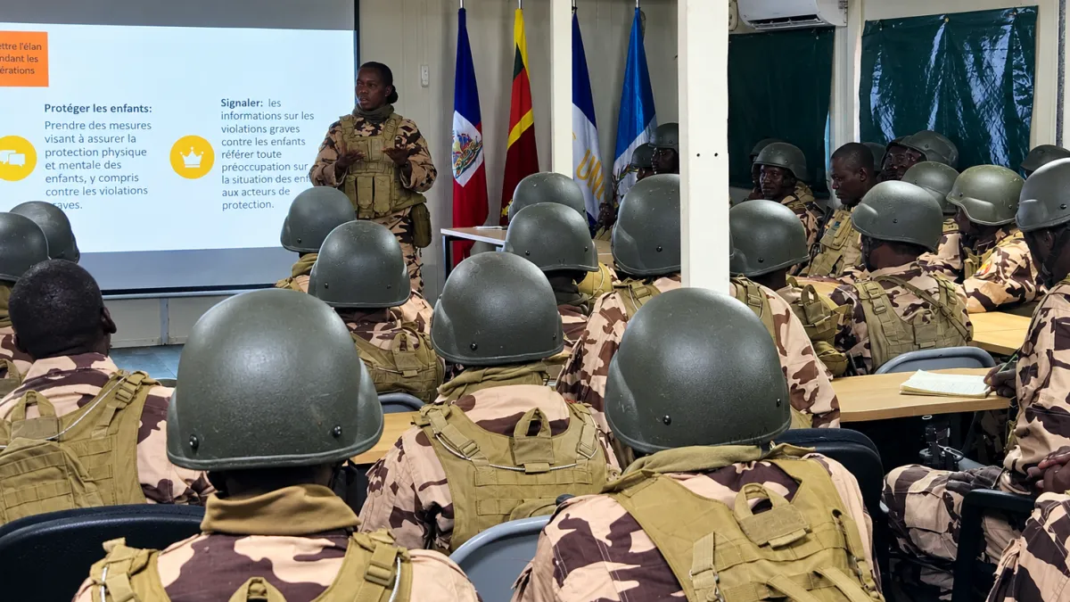 Child protection session during GSF induction training GSF personnel attending a child protection training session at Camp Vertières in Port-au-Prince.
