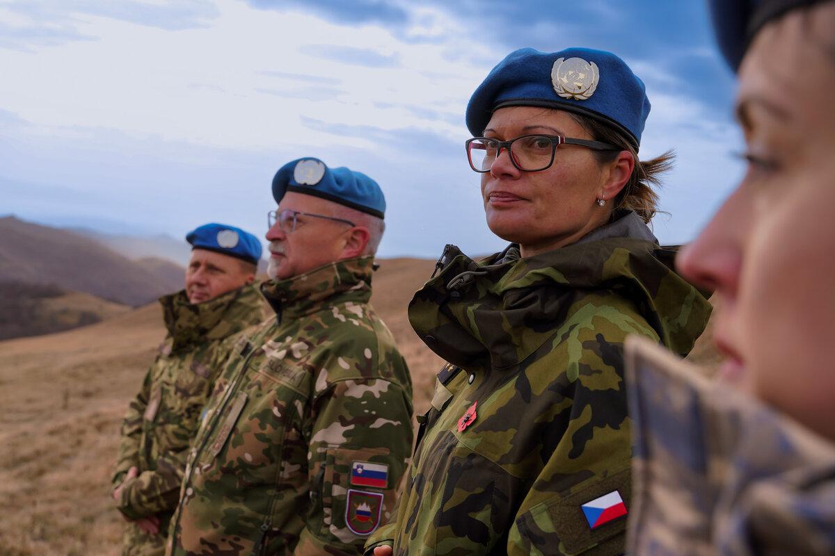 peacekeepers standing in a field