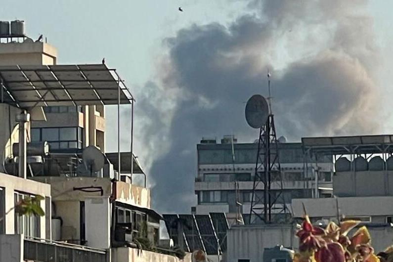 UN Photo/Pasqual Gorriz Smoke rises in Beirut, Lebanon, following the outbreak of hostilities across the Middle East.