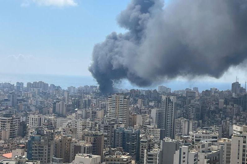 Smoke rises over the Lebanese capital Beirut in the aftermath of an airstrike.