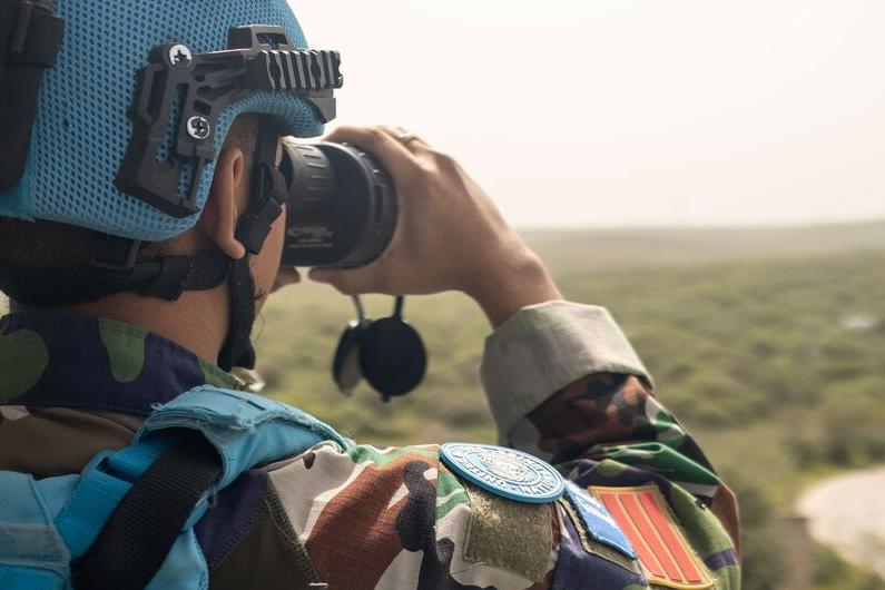 A peacekeeper monitors the Green Hill area in Naqoura, Lebanon.