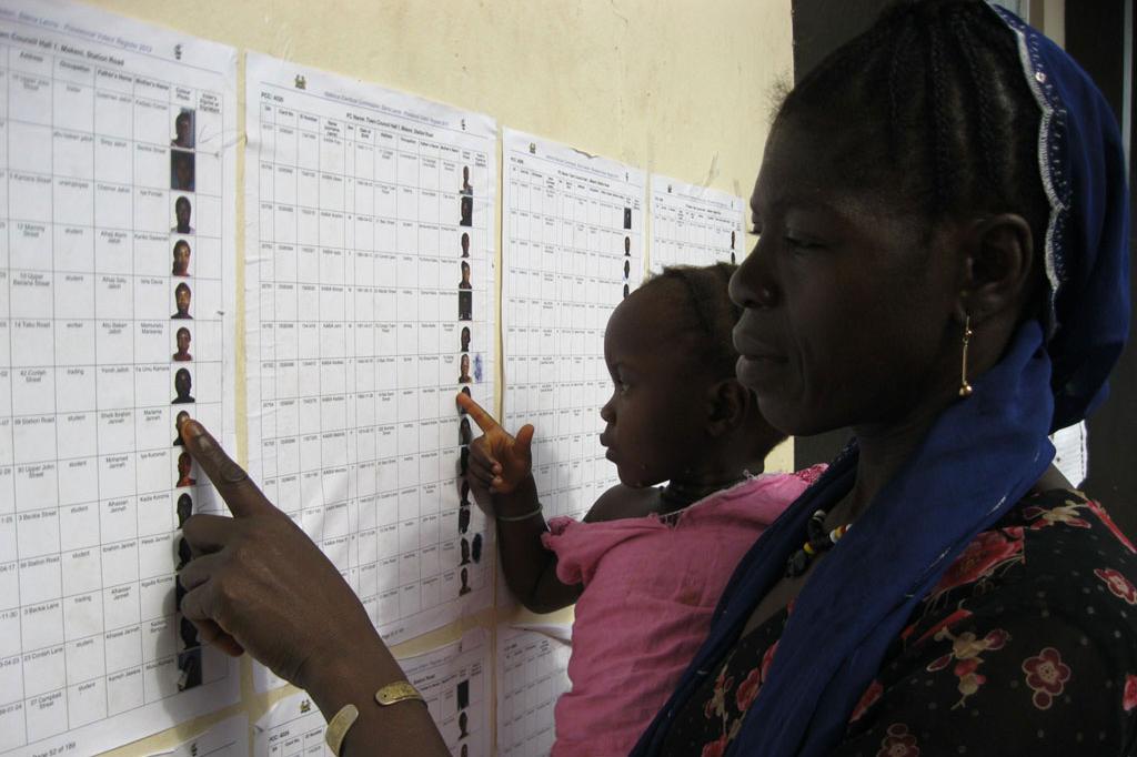 Mother and daughter checking a list