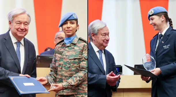 Two women receive awards from the secretary-general.